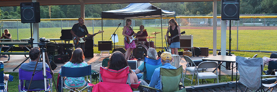 people listen to music band at Azalea park